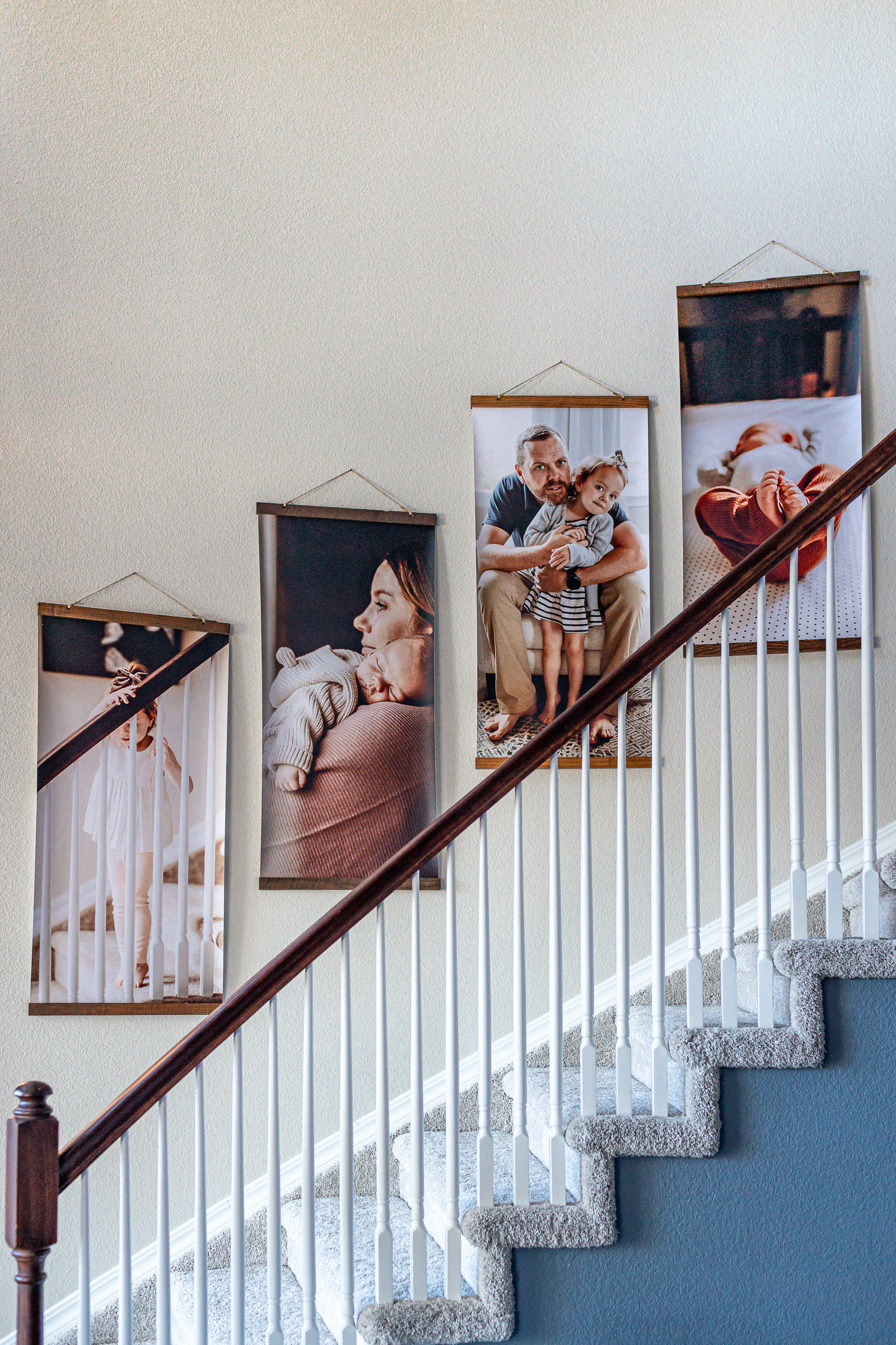 hanging canvases on stairs